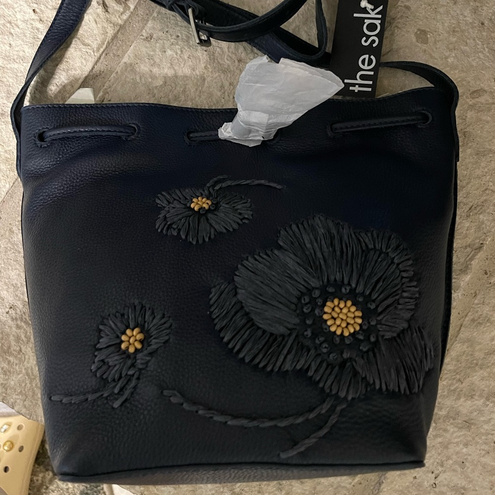 NWT The Sak Ivy Drawstring Leather Bucket Bag with flower detail embroidery !